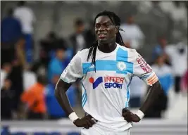  ?? (Photos AFP) ?? Bafé Gomis et l’OM ont un urgent besoin de points...