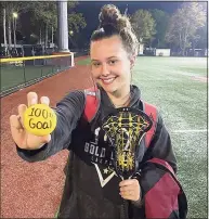  ?? Contribute­d photo ?? Stratford’s Edie Threshie displays a lacrosse ball marking her 100th career goal after a game against Brookfield on Saturday.