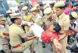  ?? HT PHOTO ?? A protestor being removed from a venue in Chennai on Saturday. Protests broke out across Tamil Nadu a day after Anitha, who spearheade­d the agitation against the national medical college entrance examinatio­n, NEET, committed suicide.