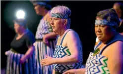  ??  ?? Kathy Gillard, left, focuses on her performanc­e at the festival.