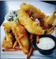  ??  ?? Fish and Chips at Square Bistro for Chardon Restaurant Week starts with tempura fried Florida red grouper, hand cut French fries, Dijon root vegetable slaw and a Cajun remoulade.