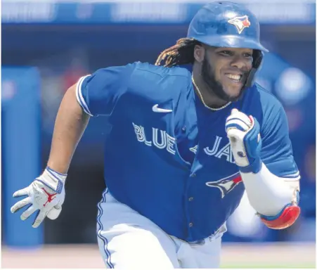  ?? USA TODAY SPORTS ?? Toronto Blue Jays fans would love nothing more than to go to Rogers Centre in Toronto and witness the fantastic season first baseman Vladimir Guerrero Jr., seen here running out an RBI single against the Baltimore Orioles at Sahlen Field in Buffalo on Sunday, has been having so far this year.