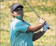  ?? GETTY IMAGES ?? Patrick Reed plays his second shot on No. 2 in Thursday’s first round of The Barclays at Bethpage Black. Reed navigated the difficult layout without a bogey.