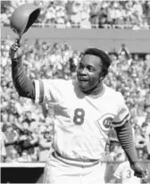  ?? AP ?? Reds second baseman Joe Morgan tips his helmet to the fans after hitting a home run against the Yankees in the 1976 World Series.