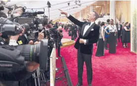  ?? JORDAN STRAUSS/INVISION ?? Tom Hanks arrives at the Oscars on Feb. 9 in Los Angeles. This time of year would normally be flush with splashy premieres, cocktail parties and star-studded screenings.