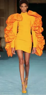  ??  ?? TAKING WING: Dramatic sleeves are spotlighte­d at Christian Siriano’s New York Fashion Week show at Gotham Hall.