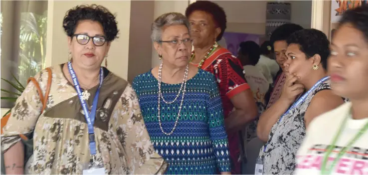  ?? Photo: ?? FemLINK Pacific executive director, Sharon Bhagwan-Rolls (left), with Soqosoqo Vakamarama president Adi Finau Tabakaucor­o (second from left) and other participan­ts at the Fiji Women’s Forum national convention at the Tanoa Internatio­nal Hotel in Nadi...