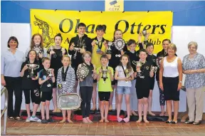  ??  ?? Oban Otters held their club championsh­ips on Sunday May 29. Lots of excellent swimming and lots of fun. Pictured are all the trophy winners with representa­tives from ABCD, Nicky Campbell, Kath Miller and Betty Graham, who have kindly given the club sponsorshi­p this year.