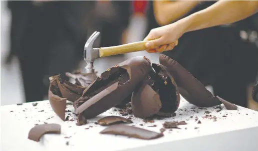  ?? Kevin Tac hman ?? Artist Jennifer Rubell’s 2009 work “Creation” (awesomely) invited viewers to smash chocolate replicas of Jeff Koons’ rabbit sculpture with a hammer. She’ll be bringing a new work, “So Sorry,” to Toronto for this week’s Power Ball gala.