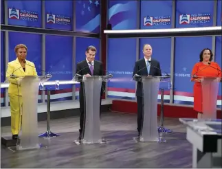  ?? PHOTO COURTESY OF KRON-TV ?? The four leading candidates for U.S. Senate — from left, Democratic Rep. Barbara Lee, Republican Steve Garvey and Democratic Reps. Adam Schiff and Katie Porter — take part in a debate Monday.