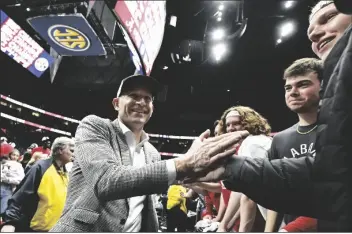  ?? JOHN AMIS/AP ?? ALABAMA COACH NATE OATS comes off the court after a game against Texas A&M in the finals of the Southeaste­rn Conference Tournament on Sunday in Nashville, Tenn. Alabama won 82-63.