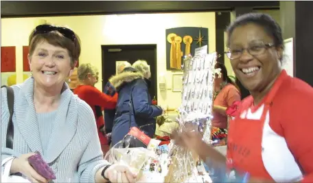  ??  ?? Fionnula Hynes and Sarah Elvey enjoying themselves at the Christmas market in the Nazareth Cafe.