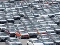  ?? JUSTIN SULLIVAN GETTY IMAGES FILE PHOTO ?? Nearly half of all vehicles sold in the United States last year were imports, according to forecastin­g firm LMC Automotive.