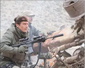  ??  ?? This image released by Warner Bros. Entertainm­ent shows Michael Shannon in a scene from “12 Strong.”