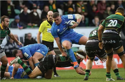  ??  ?? Tadhg Furlong of Leinster is tackled by Tom Wood of Northampto­n Saints during the Heineken Champions Cup Pool 1 Round 3 match between Northampto­n Saints and Leinster at Franklins Gardens in Northampto­n, England. Photo by Ramsey Cardy/Sportsfile