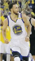 ?? JEFF CHIU / THE ASSOCIATED PRESS ?? Guard Stephen Curry reacts after scoring what proves to be the game-winning basket on Sunday.