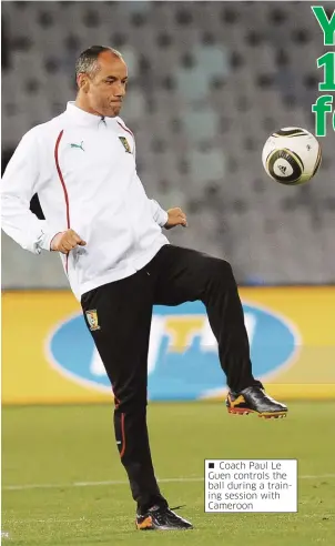  ??  ?? Coach Paul Le Guen controls the ball during a training session with Cameroon