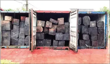  ?? FRESH NEWS ?? Three containers show illegal luxury wood that was confiscate­d in Kampot province on Tuesday.