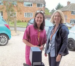  ??  ?? Lisa Bull and Julia Battle from the Berkshire Sensory Consortium Service and (right) a radio aid.