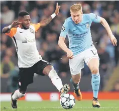  ??  ?? Manchester City’s Kevin De Bruyne (right) in action with Shakhtar Donetsk’s Fred during the Group F football match at the Etihad Stadium in Manchester, north west England. — Reuters photo