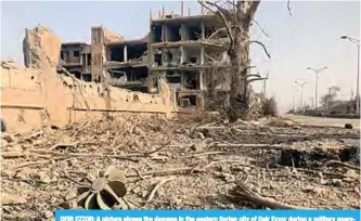  ?? —AFP ?? DEIR EZZOR: A picture shows the damage in the eastern Syrian city of Deir Ezzor during a military operation by government forces against Islamic State (IS) group jihadists.