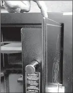  ?? Arkansas Democrat-Gazette/BRYAN HENDRICKS ?? Metal thickness is the key factor that prevents a thief from being able to pry open the door of a safe. Thin, 12- or 14-gauge metal can be flexed enough with a prybar to make the locking pins, shown at top, pop out of their sockets.