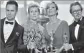  ??  ?? Actors Sam Rockwell, Frances McDormand, Allison Janney, and Gary Oldman, pose in the press room with their Oscars for best supporting actor, best actress, best supporting actress, and best actor, during the 90th Annual Academy Awards in Hollywood,...