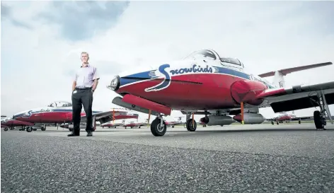  ?? JULIE JOCSAK/POSTMEDIA NEWS ?? Len O’Connor, chief executive officer of Niagara District Airport, is photograph­ed by the Snowbirds. The Snowbirds will put on a show at the Niagara-on-theLake airport Wednesday afternoon.