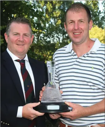  ??  ?? Niall Nolan presents his Courtown Captain’s prize to Paul Kavanagh.