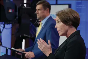  ?? STEVEN SENNE — AP PHOTO. ?? Massachuse­tts gubernator­ial candidates Geoff Diehl and Maura Healey squared off for their first debate on Wednesday, Oct. 12, 2022.