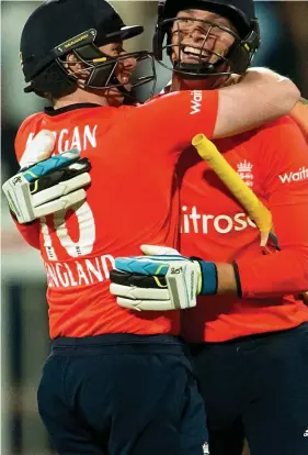  ??  ?? Whitewash: Morgan (left) and Buttler celebrate a dramatic win
AFP