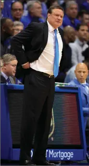  ?? (AP/Orlin Wagner) ?? Kansas Coach Bill Self called Thursday “a strange day” when the Big 12 and the NCAA tournament­s were canceled. The Jayhawks were ranked No. 1 in The Associated Press poll at the time of the announceme­nt.