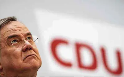  ?? Foto: dpa ?? In der Defensive: Der CDU-Bundesvors­itzende Armin Laschet ist noch nicht lange im Amt, muss aber schon zwei schwere Wahlschlap­pen erklären.