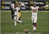  ?? JUSTIN BERL — THE ASSOCIATED PRESS ?? Washington Football Team defensive end Chase Young (99) reacts following a 23-17 win over the Steelers on Monday in Pittsburgh.