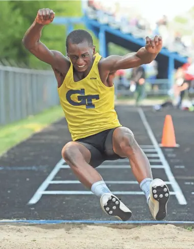  ?? MICHAEL MCLOONE / MILWAUKEE JOURNAL SENTINEL ?? Germantown senior Shon Pratcher won both the long jump and triple jump at the Germantown Sectional on Thursday.