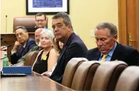  ?? Arkansas Democrat-Gazette/Thomas Metthe ?? Bill Hollenbeck, second from right, chief of Fort Smith Public Schools Police, and members of the Arkansas School Safety Commission watch a presentati­on Tuesday during the group’s meeting at the state Capitol in Little Rock.