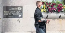  ??  ?? Patryck Pogodzinsk­i leaves Aberdeen Sheriff Court.