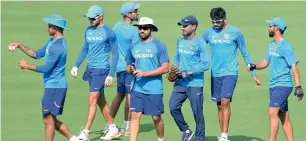  ?? AFP ?? Indian players during a practice session ahead of the final ODI in Visakhapat­nam on Saturday. —