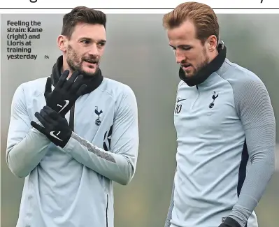  ??  ?? Feeling the strain: Kane (right) and Lloris at training yesterday