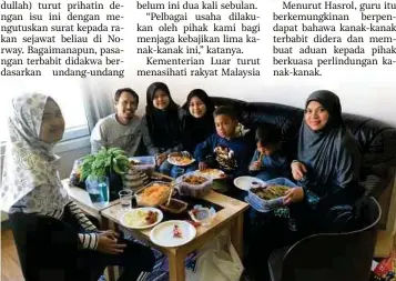  ??  ?? PASANGAN Hairi dan Norliha bersama anak-anak mereka di Norway.