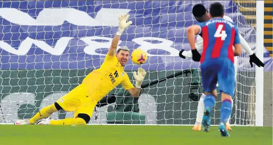  ?? PA/GETTY IMAGES ?? KEY MOMENTS: Left, Harvey Barnes scores City’s equaliser after creating space with a jinking run. Above, Kelechi Iheanacho sees his penalty saved by Crystal Palace keeper Vicente Guaita. Below, Wilfried Zaha’s fine volley past Kasper Schmeichel puts Palace ahead and, bottom, Papy Mendy gets in a tangle with Jairo Riedewald as they both battle for possession