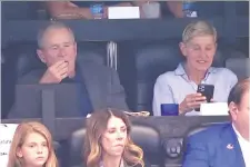  ?? FOX/NFL ?? George W. Bush, left, and Ellen DeGeneres watched the NFL’s Green Bay Packers take on Dallas Sunday from the Cowboys’ owner’s suite.