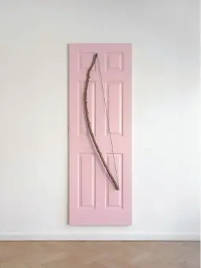  ?? ?? Keith Farquar, Barbecue, 2020, household paint on found door, wood, nylon cord, robe hook, 198 × 69 × 4 cm. Photo: Pieter Huybrechts. Courtesy the artist and O ce Baroque, Antwerp