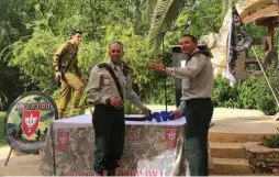  ?? (Nahal Haredi Organizati­on) ?? LT.-COL. NITAI OKASHI (center) and Brig-Gen. David Zini attend a ceremony in Shiloh on Thursday.