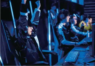  ?? ?? Dedicated gamers are immersed in the 2023 eSports Shanghai Masters, held earlier this month in Jing’an District. — Photos by Ti Gong