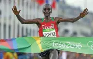  ?? - Reuters/Athit Perawongme­tha/Files ?? STRICT MEASURES: Eliud Kipchoge (KEN) of Kenya crosses the finish line to win gold at the Rio de Janeiro Olympics in 2016.