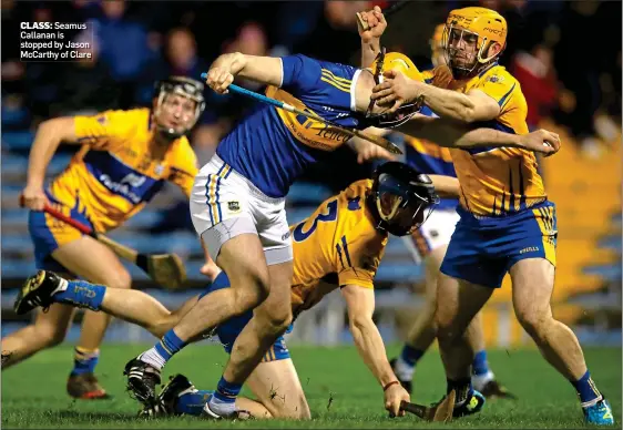  ??  ?? CLASS:Seamus Callanan is stopped by Jason McCarthy of Clare