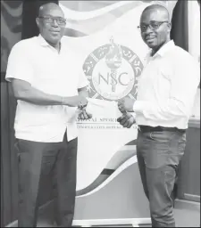  ?? ?? Director of Sport, Steve Ninvalle along with CEO of Fitness Express, Jamie McDonald and Managing Director of DTS Trading, Derek Stony presented sponsorshi­p cheques to President of the federation, Keavon Bess for tomorrow’s bodybuildi­ng championsh­ips.