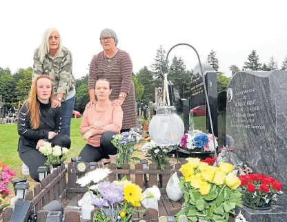  ??  ?? Morgan Grubb, Jane Hunt, Karen Longmuir and Lesley Nicoll at Jane’s father’s grave which was daubed with white paint.