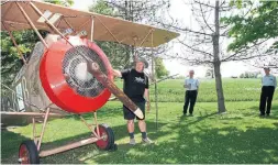  ??  ?? Baron carved a fence post for the propeller and used juice tins as engine cylinders in his replica of a 1916 Sopwith Camel.